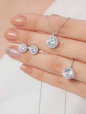 Sparkling diamond necklace and earrings with fine silver details. Perfect for special occasions.