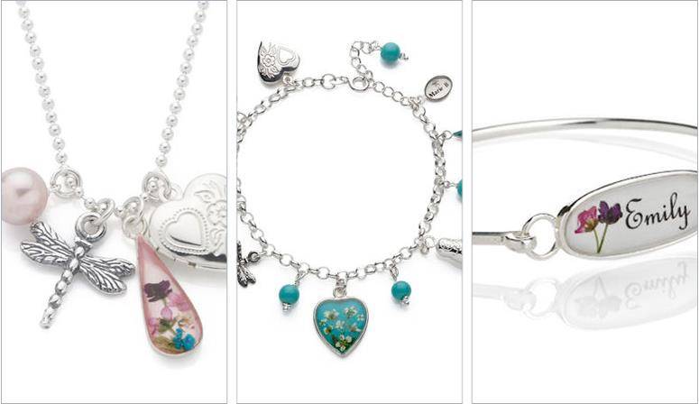 Elegant silver jewelry with charms and personalised name bracelet, perfect for special occasions.